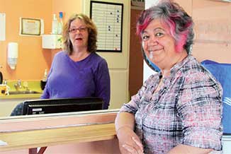 Ann, left, is a volunteer at the Levin Budget Service (Inc) and helps out at reception. Not all volunteers are budget advisors. 