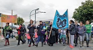 Young and old, Maori and Pakeha assemble at the kura for the hikoi  (Photo Chris Grenville)